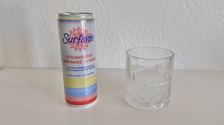 Strawberry Lemonade + Vodka poured in a glass