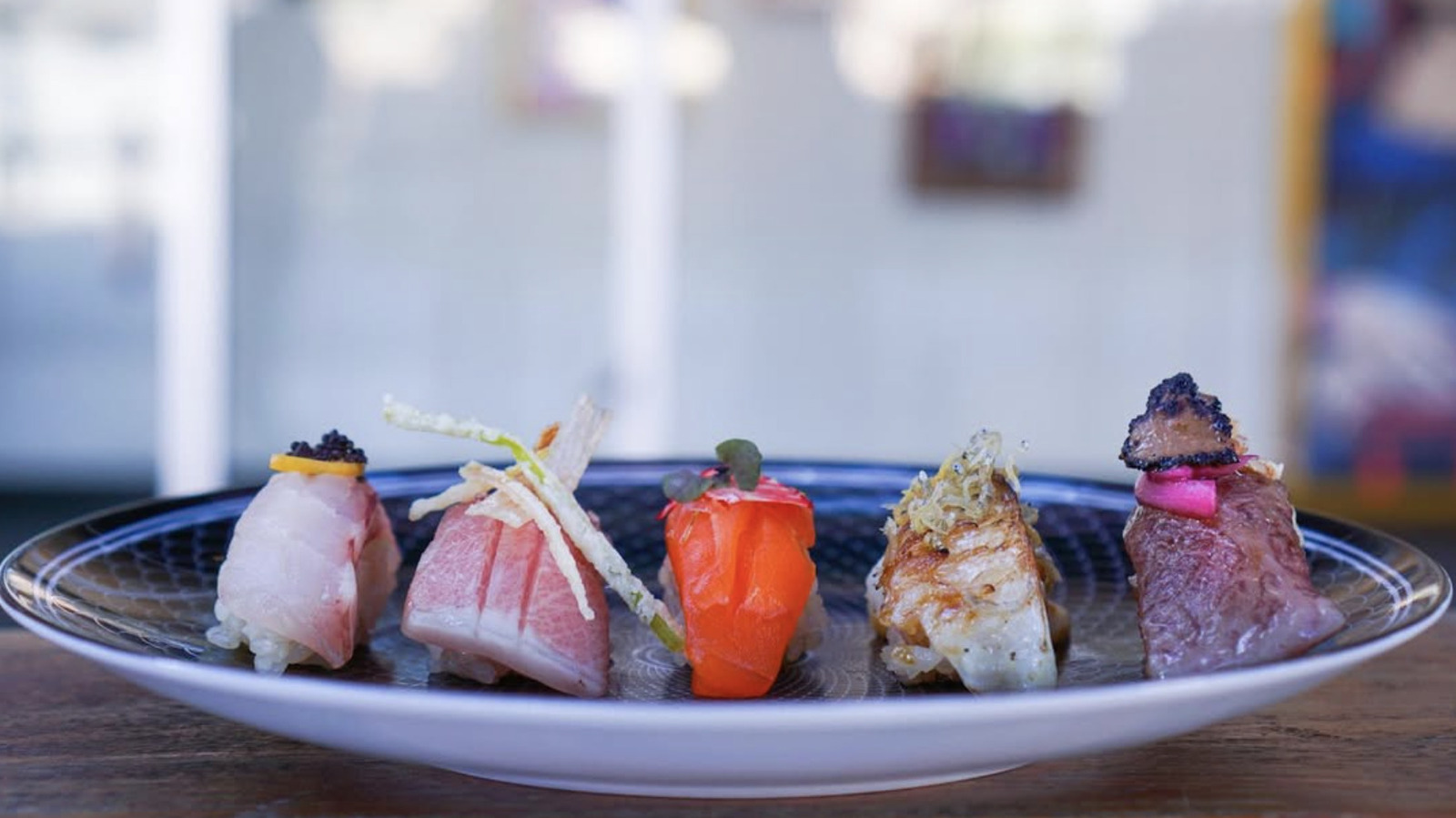 This Sushi Restaurant In Houston Is Hidden Behind A Painting - Tasting Table