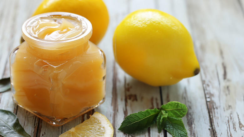lemon curd jar with lemons