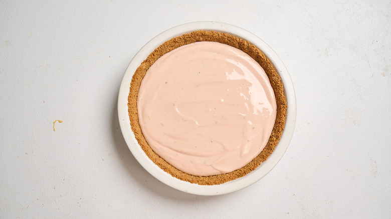 unbaked filling smoothed into crust