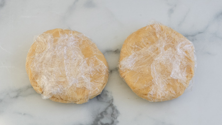 empanada dough wrapped in plastic