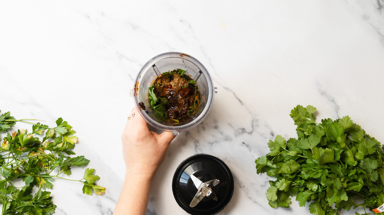 Chermoula ingredients in blender cup