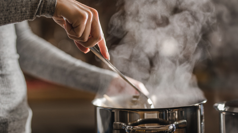steam from pot in kitchen