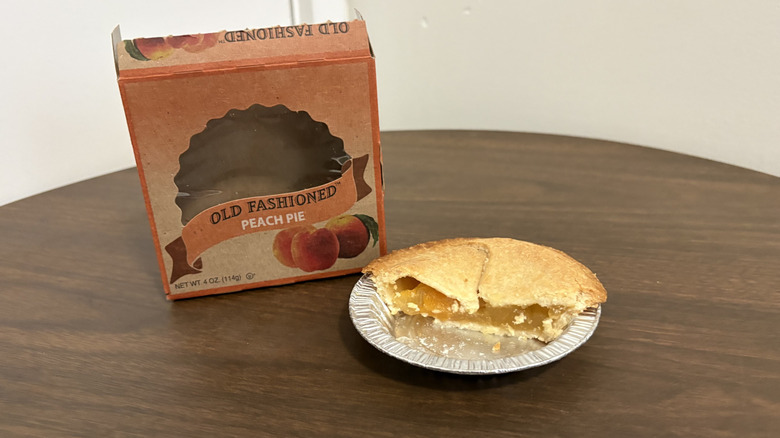 Table Talk old fashioned peach pie sliced in half and box on a table