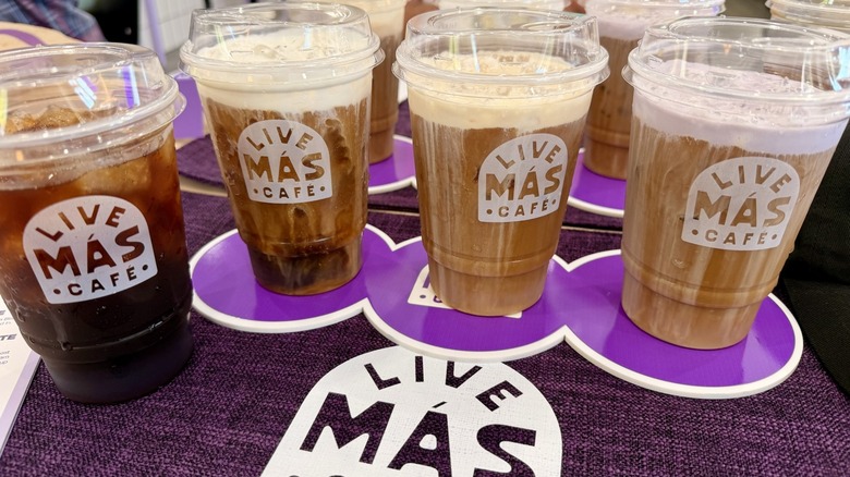 A cup of Taco Bell's Cold Brew Coffee plus three with Cold Foam Toppings