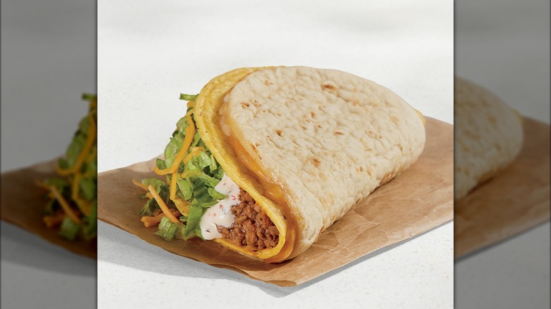 Cheesy Gordita Crunch on a paper wrapper