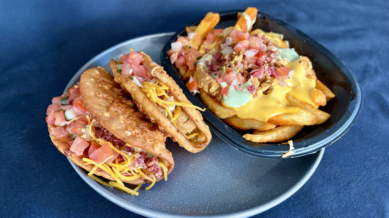 Taco Bell chalupas and nacho fries on a plate