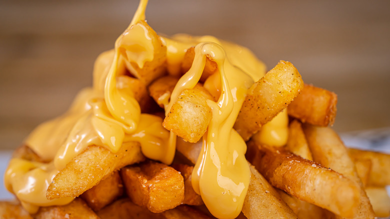 nacho cheese poured over fries