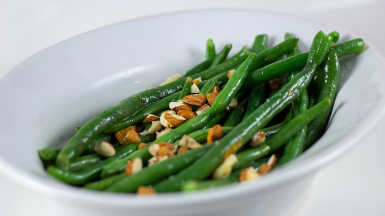 Dish of green bean almondine