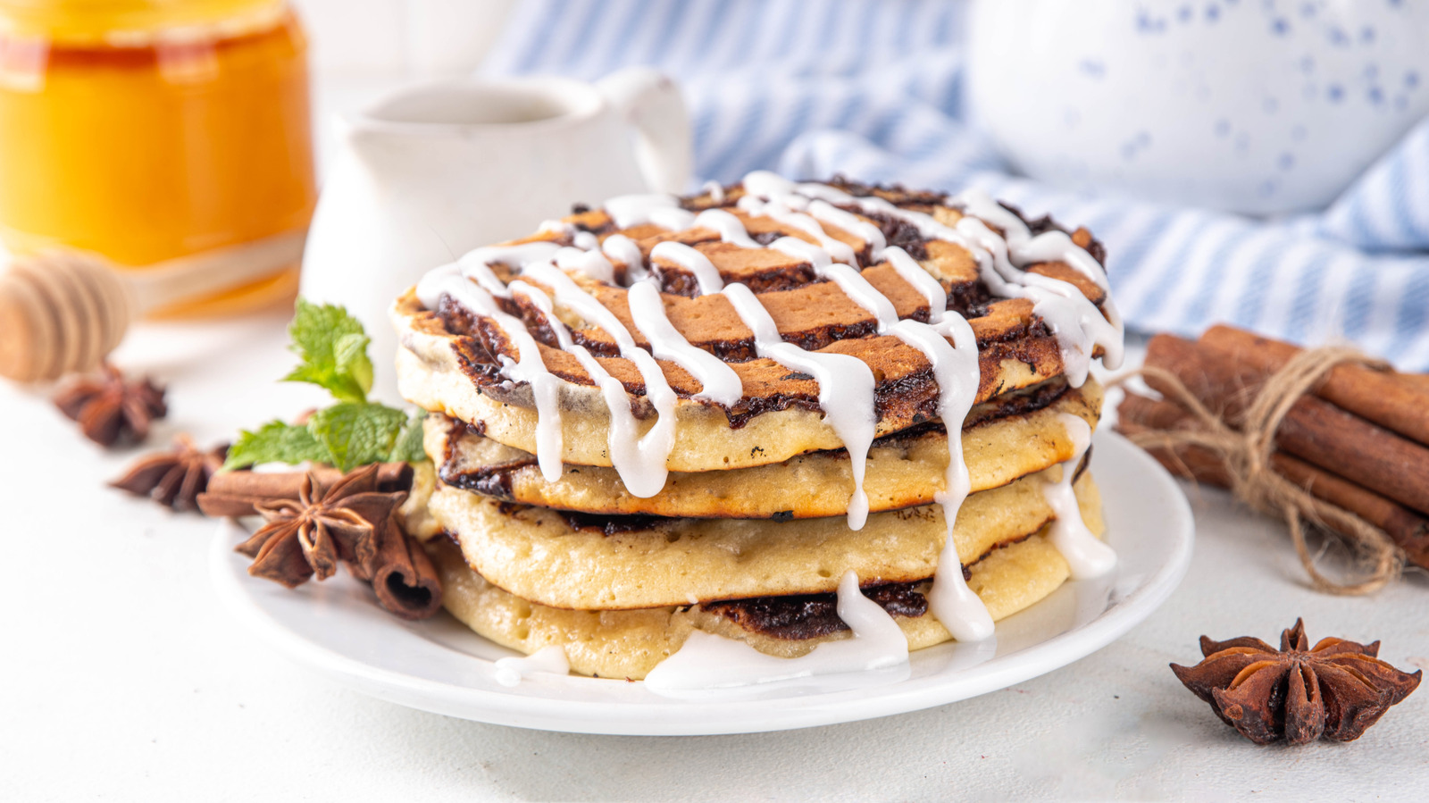 Take One Extra Step To Turn Canned Cinnamon Rolls Into Dreamy Pancakes - Tasting Table