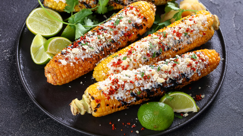 a plate of elote corn