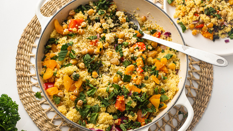 pot of moroccan couscous with veggies and chickpeas