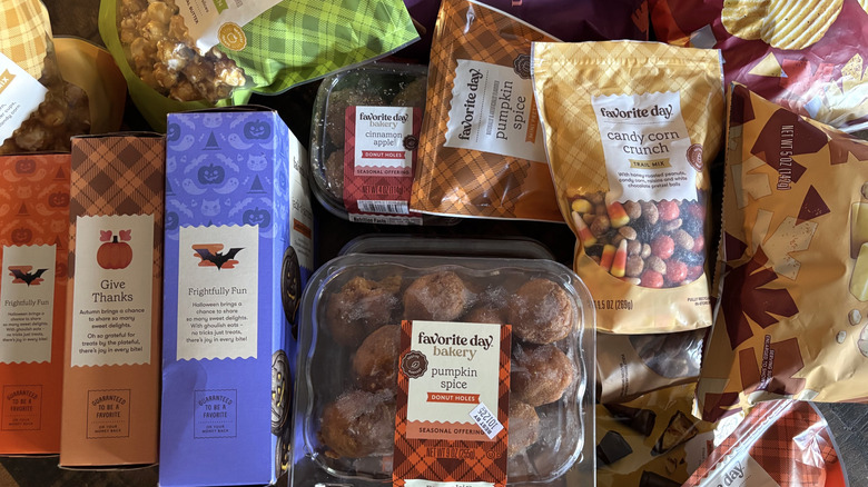 A variety of Good&Gather and Favorite Day fall snacks on a black background.