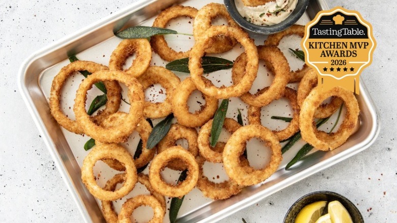 Nordic Ware Naturals aluminum sheet pan filled with crispy onion rings