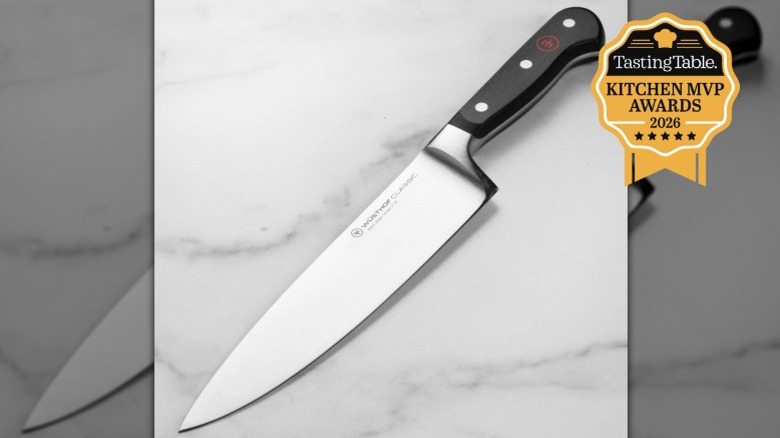 Wusthof Chef's Knife on gray marble background