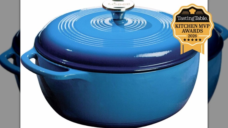 Lodge cast iron Dutch oven on white surface
