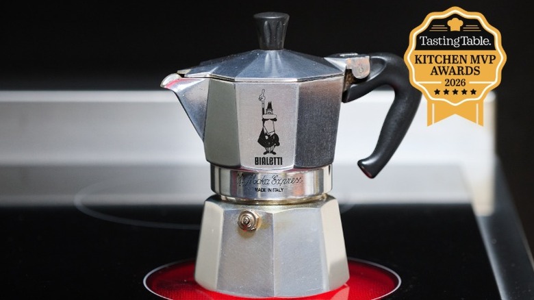 Small Bialetti moka pot on an electric stovetop
