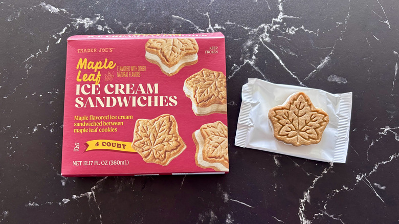 Trader Joe's maple leaf ice cream sandwich box next to ice cream sandwich on wrapper