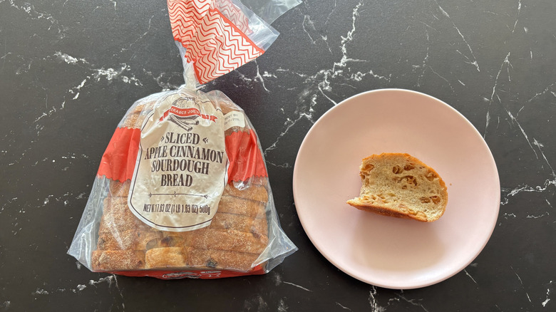 Trader Joe's apple cinnamon sourdough loaf next to slice on plate