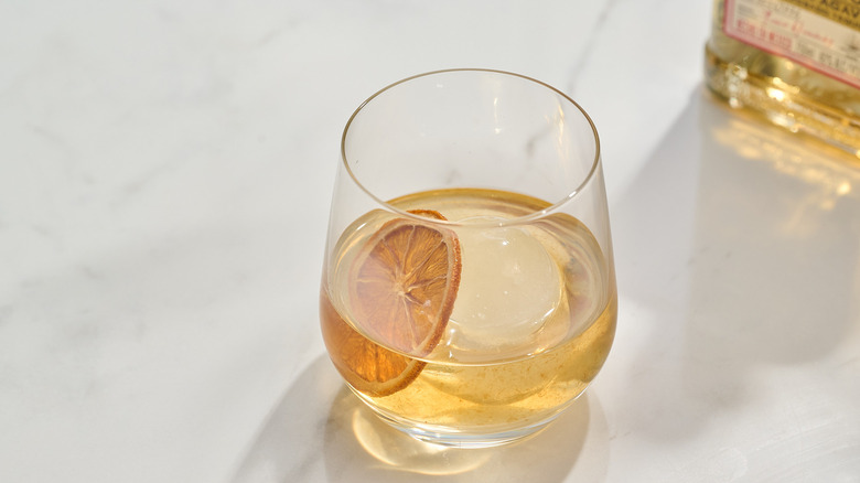 tequila old fashioned in a glass on a table