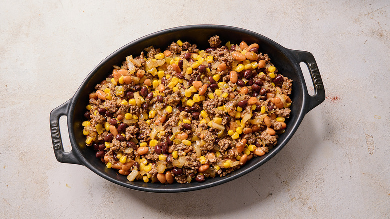 beans and beef in a casserole dish