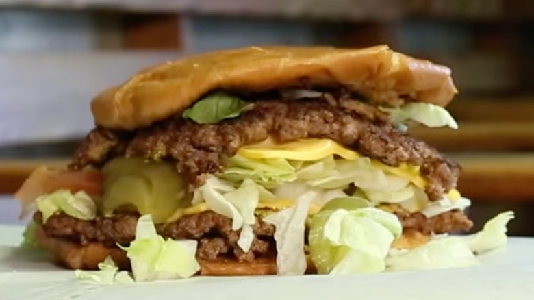 Herd's burger with lettuce and cheese