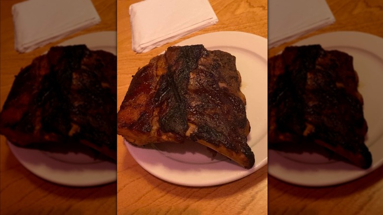 Sidekick of ribs on white plate at Texas Roadhouse