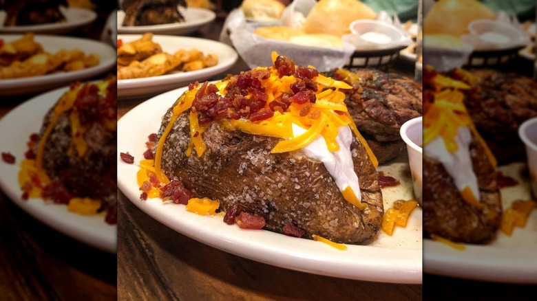 Texas Roadhouse loaded baked potato on white plate