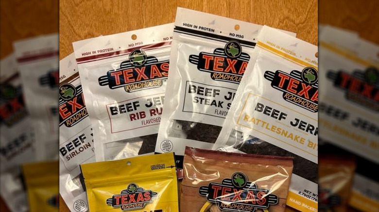 A table with Texas Roadhouse's four beef jerky flavors