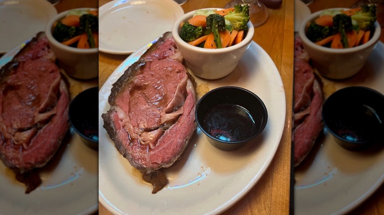 Texas Roadhouse prime rib with side of vegetables