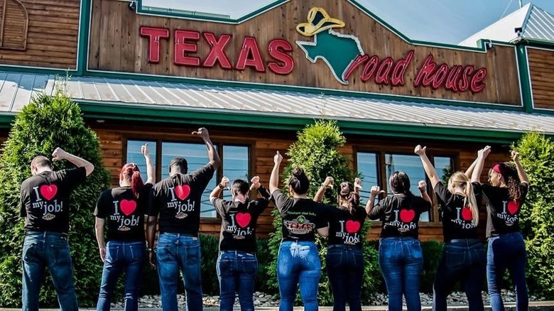 Texas Roadhouse employees standing lined up, wearing 