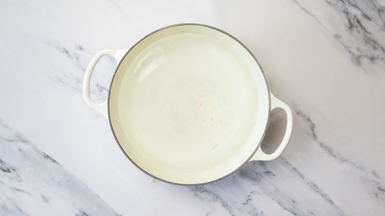 Boiled water in large pot.