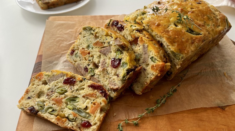 sliced of quick bread with cranberries