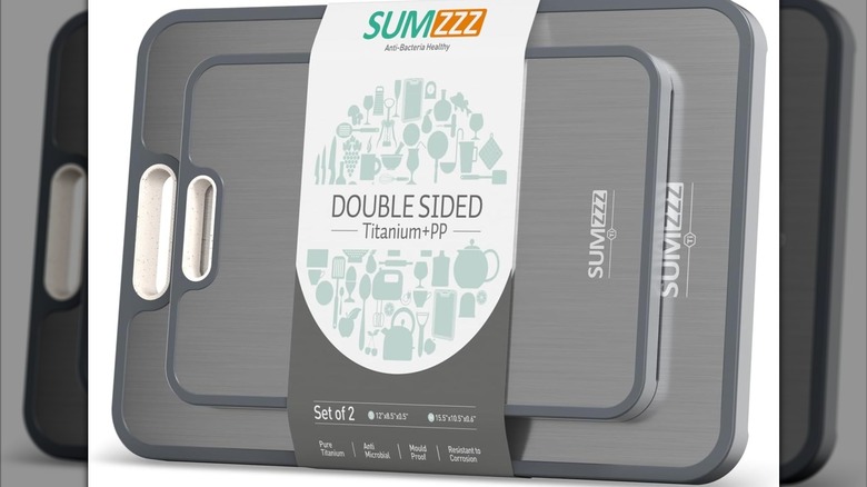 The packaged boards together showing their label and titanium sides