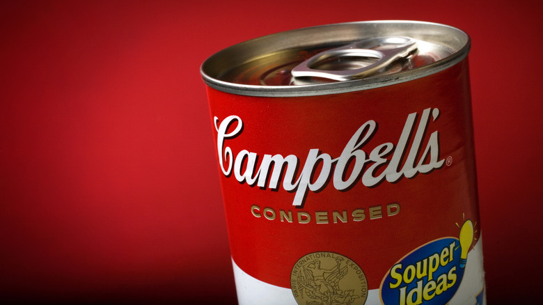 Top of a can of Campbell's soup on deep red background