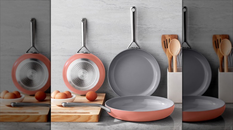 Three terracotta Member's Mark modern ceramic frying pans on kitchen countertop