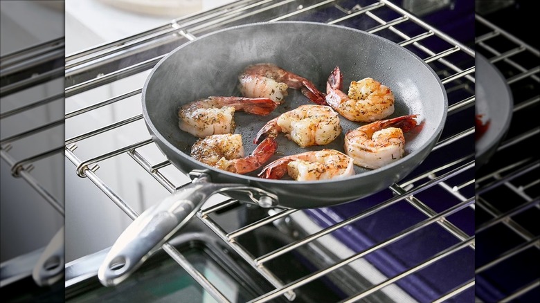 Shrimp in a Valencia Pro ceramic GreenPan on an oven rack