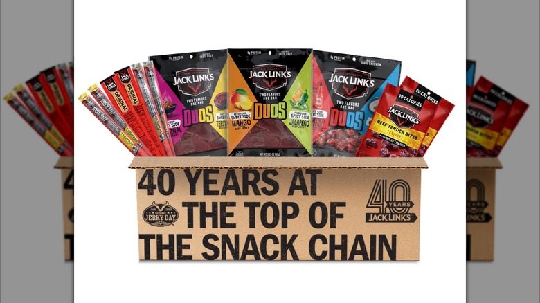 Bags of beef jerky and meat stick snacks from Jack Links inside cardboard box