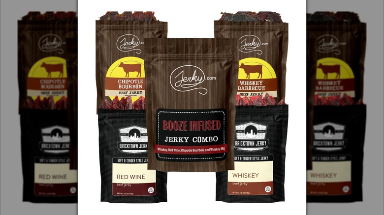Bags of alcohol-infused beef jerkies from Jerky.com on white background