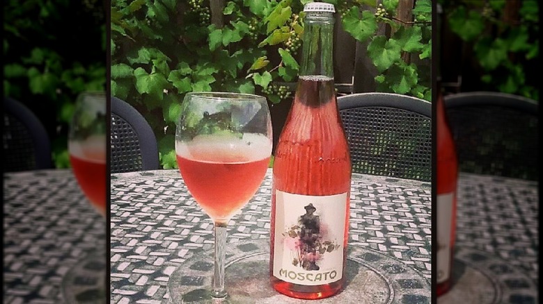 bottle and glass of rose moscato