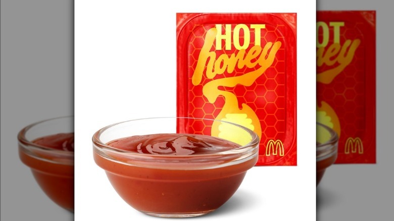 A bowl and packet of McDonald's Hot Honey