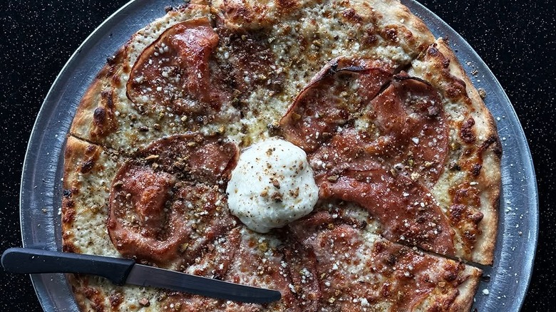 Top view of The Thud Butt mortadella pizza at Little Bettie