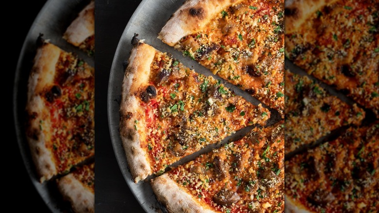 Sliced eggplant parmesan pizza at Pizzeria Lola