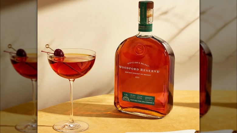 Bottle of Woodford Reserve Rye with cocktail