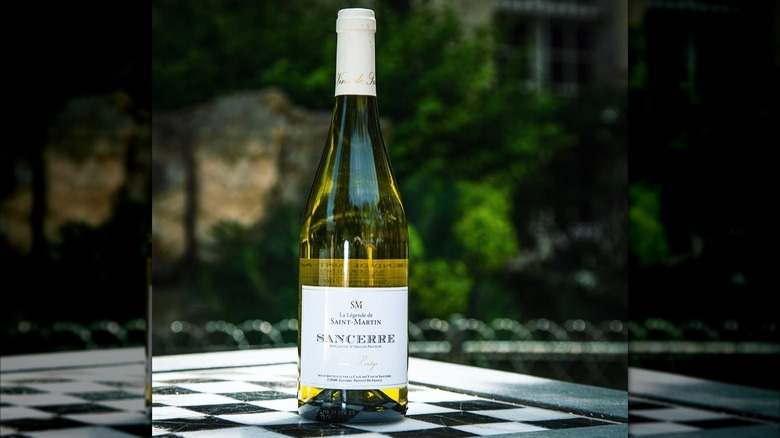 bottle of white wine on table