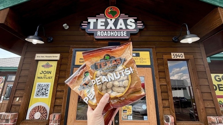 Bags of peanuts held outside a Texas Roadhouse entrance