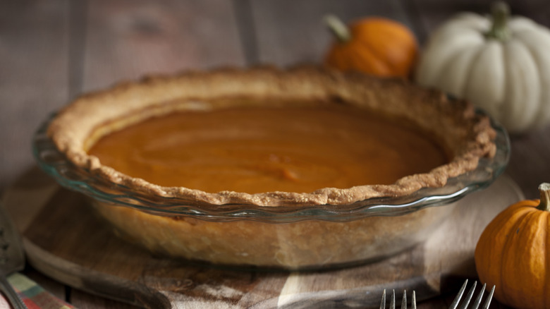 pumpkin pie in glass dish