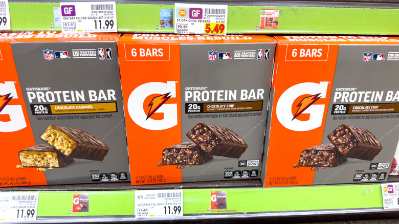 Grocery store shelf with assortment of Gatorade Protein Bars