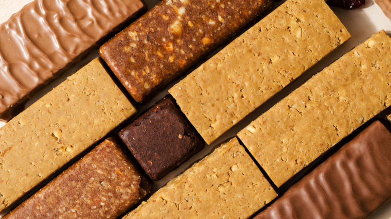 Close up of various protein bars lined up on a table