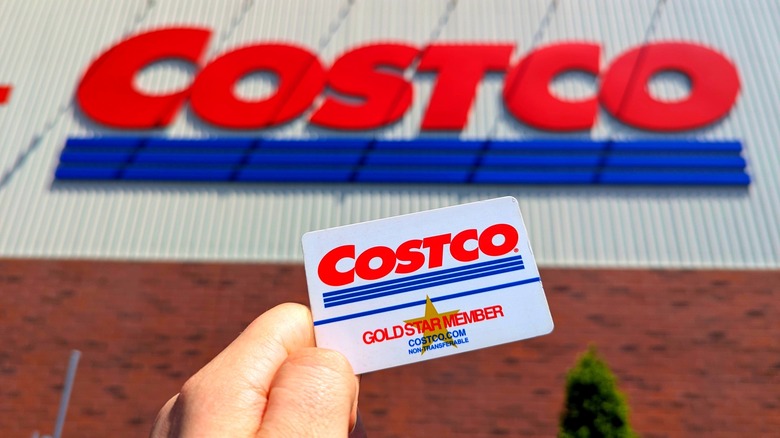 Costco card held in front of Costco